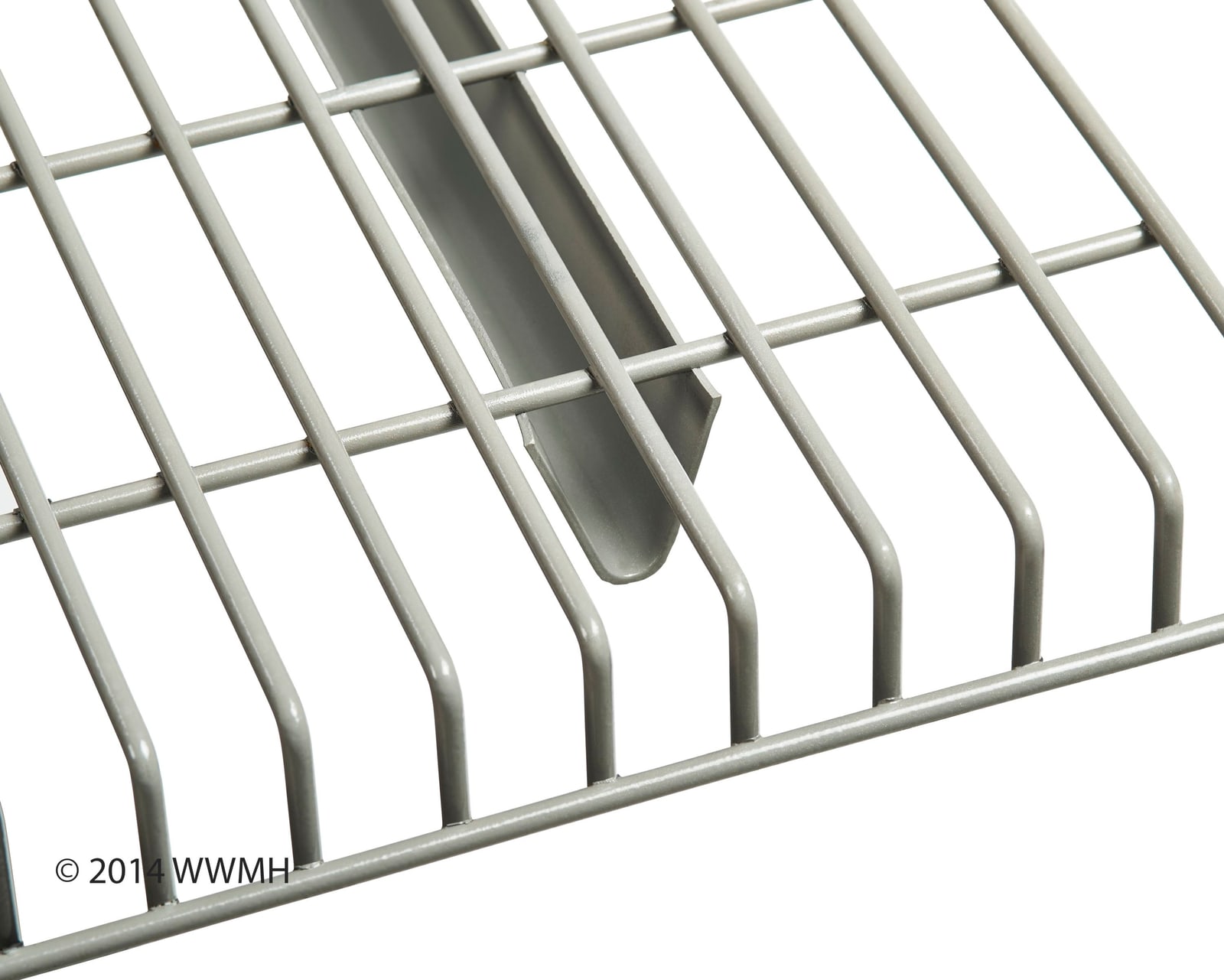 Close-up of a step channel wire deck, showing the formed steel support channel running beneath the welded wire mesh